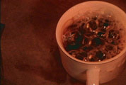 The coffee boils in its cup